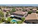 Aerial view of house with backyard pool and surrounding neighborhood at 1918 W Bonanza Ln, Phoenix, AZ 85085