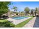 Luxury backyard with pool, patio, and fire pit at 1918 W Bonanza Ln, Phoenix, AZ 85085