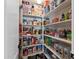 Well-organized pantry with ample shelving at 1918 W Bonanza Ln, Phoenix, AZ 85085