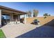 Backyard patio with built-in grill and seating at 2052 N Montclair Ln, Casa Grande, AZ 85122