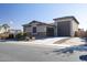 House exterior with stone accents and American flag at 2052 N Montclair Ln, Casa Grande, AZ 85122