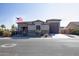 Single-story home with stone accents and a large garage at 2052 N Montclair Ln, Casa Grande, AZ 85122