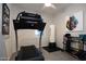 Home gym with treadmill, punching bag and weights at 2052 N Montclair Ln, Casa Grande, AZ 85122