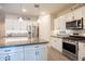 Modern kitchen with stainless steel appliances and large kitchen island at 2052 N Montclair Ln, Casa Grande, AZ 85122