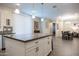 Modern kitchen with a large island, white cabinets, and granite countertops at 2052 N Montclair Ln, Casa Grande, AZ 85122