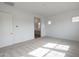 Bedroom with carpet flooring leading into the ensuite bathroom at 22663 E Happy Rd, Queen Creek, AZ 85142