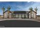 Community center with solar panels and ample parking at 22669 E Happy Rd, Queen Creek, AZ 85142