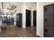 Fitness center hallway with lockers and a water fountain at 22669 E Happy Rd, Queen Creek, AZ 85142