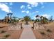 Two playgrounds connected by a walkway at 22669 E Happy Rd, Queen Creek, AZ 85142