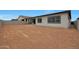 The backyard featuring a large dirt area with perimeter fencing at 22670 E Happy Rd, Queen Creek, AZ 85142