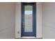 Beautiful blue front door with glass panel and modern hardware at 22670 E Happy Rd, Queen Creek, AZ 85142