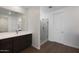 Contemporary bathroom featuring a glass shower, vanity with sink, and neutral finishes at 23128 E Watford Dr, Queen Creek, AZ 85142