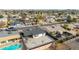 Aerial showcasing house, backyard, pool and neighborhood at 2317 W Danbury Rd, Phoenix, AZ 85023