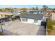 Aerial view of house with large backyard, basketball court and lights at 2317 W Danbury Rd, Phoenix, AZ 85023