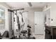 Home gym with weight machine and additional storage at 2317 W Danbury Rd, Phoenix, AZ 85023