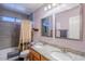 Bathroom with double vanity and grey tile at 23619 N 21St St, Phoenix, AZ 85024