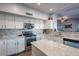 Modern kitchen with stainless steel appliances and granite countertops at 23619 N 21St St, Phoenix, AZ 85024