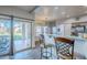 Kitchen with granite countertops, stainless steel appliances, and a view of the backyard at 23619 N 21St St, Phoenix, AZ 85024