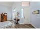 Living room with hardwood floors, antique furniture, and high ceilings at 23619 N 21St St, Phoenix, AZ 85024