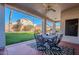 Covered patio with seating area, perfect for outdoor dining at 23619 N 21St St, Phoenix, AZ 85024