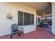 Spacious covered patio with storage and seating at 23619 N 21St St, Phoenix, AZ 85024