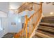 Wooden staircase leading to the second floor of the home at 23619 N 21St St, Phoenix, AZ 85024