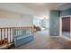 Upstairs hallway with a built-in bench and carpeted flooring at 23619 N 21St St, Phoenix, AZ 85024