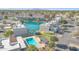 Aerial view of community near lake and featuring a pool at 2524 S El Paradiso Dr # 74, Mesa, AZ 85202