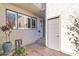 Private condo entry with gray door and sidelights at 2524 S El Paradiso Dr # 74, Mesa, AZ 85202