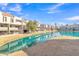 Residential buildings overlook a peaceful lake and green areas at 2524 S El Paradiso Dr # 74, Mesa, AZ 85202