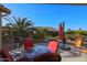 Patio furniture and grill overlooking the backyard at 2605 E San Thomas Dr, Casa Grande, AZ 85194