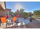 Relaxing backyard patio with seating and grill at 2605 E San Thomas Dr, Casa Grande, AZ 85194