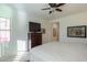 Bright bedroom with a dresser and large TV at 2605 E San Thomas Dr, Casa Grande, AZ 85194