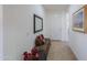 Bright entryway with bench seating and a mirror at 2605 E San Thomas Dr, Casa Grande, AZ 85194