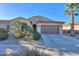 Single-story home with desert landscaping and a two-car garage at 2605 E San Thomas Dr, Casa Grande, AZ 85194