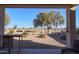 Spacious backyard with a golf course view and mature trees at 2622 E Marcos Dr, Casa Grande, AZ 85194