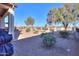 Backyard view showcasing desert landscaping at 2622 E Marcos Dr, Casa Grande, AZ 85194