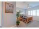 Bright bedroom with a log bed frame and plantation shutters at 2622 E Marcos Dr, Casa Grande, AZ 85194