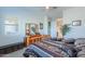 Serene bedroom with log furniture and a view to a private bathroom at 2622 E Marcos Dr, Casa Grande, AZ 85194