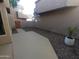 Small patio area with gravel landscaping and potted plant at 2834 S Extension Rd # 1032, Mesa, AZ 85210