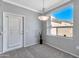 Cozy dining area with a large window and white shutters at 29606 N Tatum Blvd # 216, Cave Creek, AZ 85331