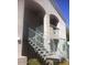 Exterior view of building entrance with stairs and metal railing at 29606 N Tatum Blvd # 216, Cave Creek, AZ 85331