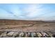 Aerial view of houses and desert landscape at 30255 N 115Th Dr, Peoria, AZ 85383