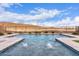 Cool off in this sparkling pool with water features at 30255 N 115Th Dr, Peoria, AZ 85383