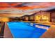 Stunning backyard oasis featuring a sparkling pool, patio, and landscape at 30255 N 115Th Dr, Peoria, AZ 85383