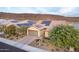 Single-story home with solar panels and desert landscaping at 30255 N 115Th Dr, Peoria, AZ 85383