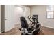 Home gym with recumbent exercise bike at 30255 N 115Th Dr, Peoria, AZ 85383