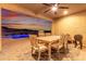 Outdoor patio with dining area and pool view at 30255 N 115Th Dr, Peoria, AZ 85383