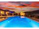 Relaxing pool with sunset backdrop at 30255 N 115Th Dr, Peoria, AZ 85383