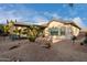 Desert landscaping with covered patio, seating area, and pergola at 30792 N Orange Blossom Cir, San Tan Valley, AZ 85143